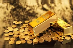 Gold Gains as Investors Brace for U.S. Jobs Report and Fed Minutes